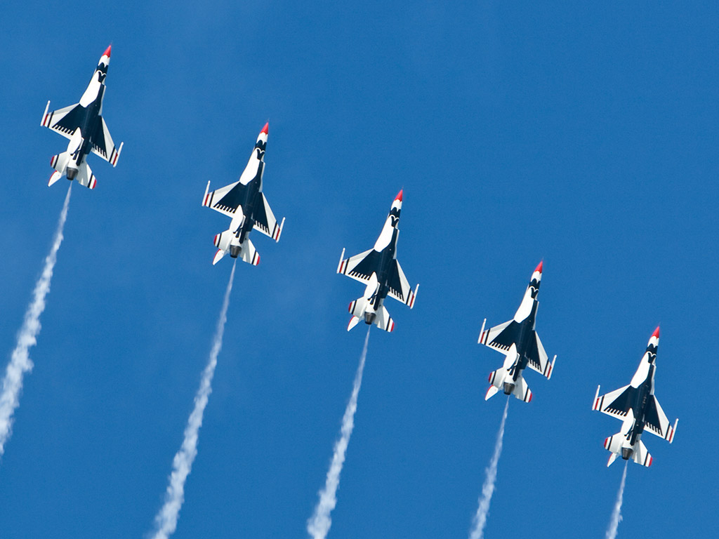 US Air Force Thunderbirds doing a flyover The US Air Force Thunderbirds flying in formation